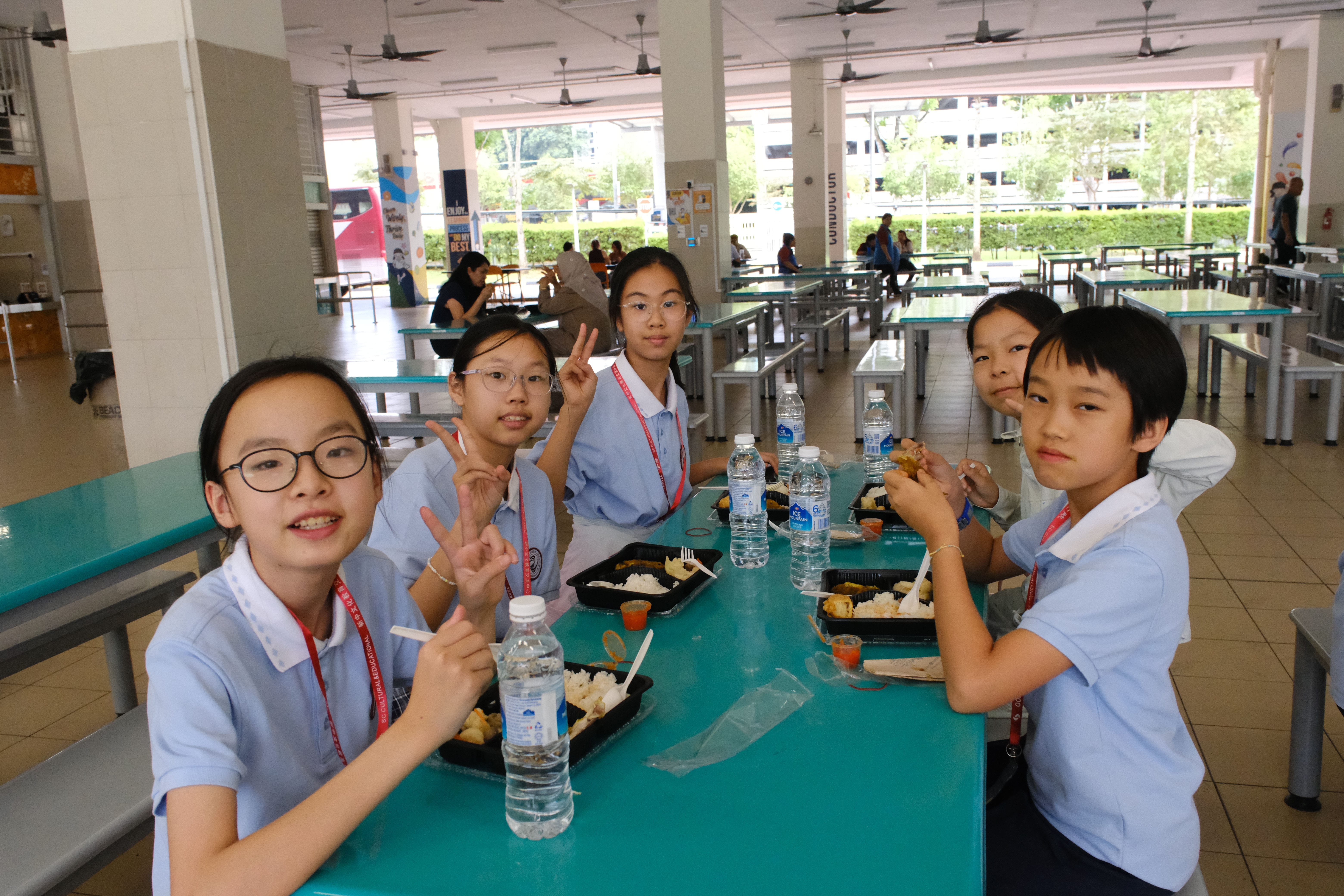 Students enjoy eating lunch together.